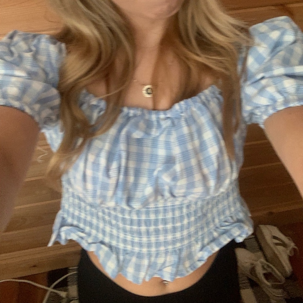 blue and white striped crop top with puffy shoulders
